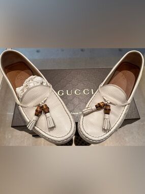 Gucci Cream Leather Tassel Loafers with Wooden Accents